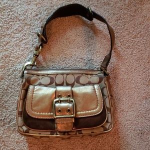 Gold and brown Coach purse